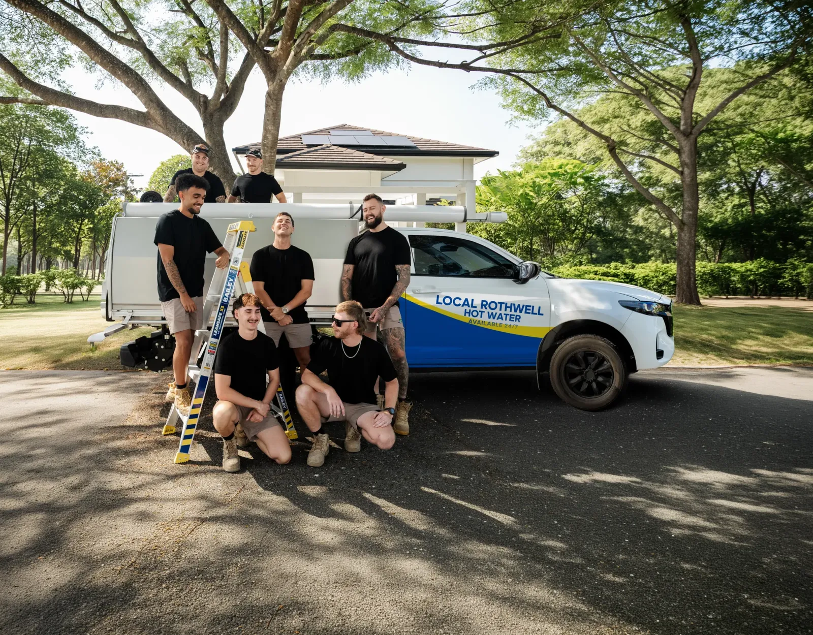 Local Rothwell Hot Water ute and team